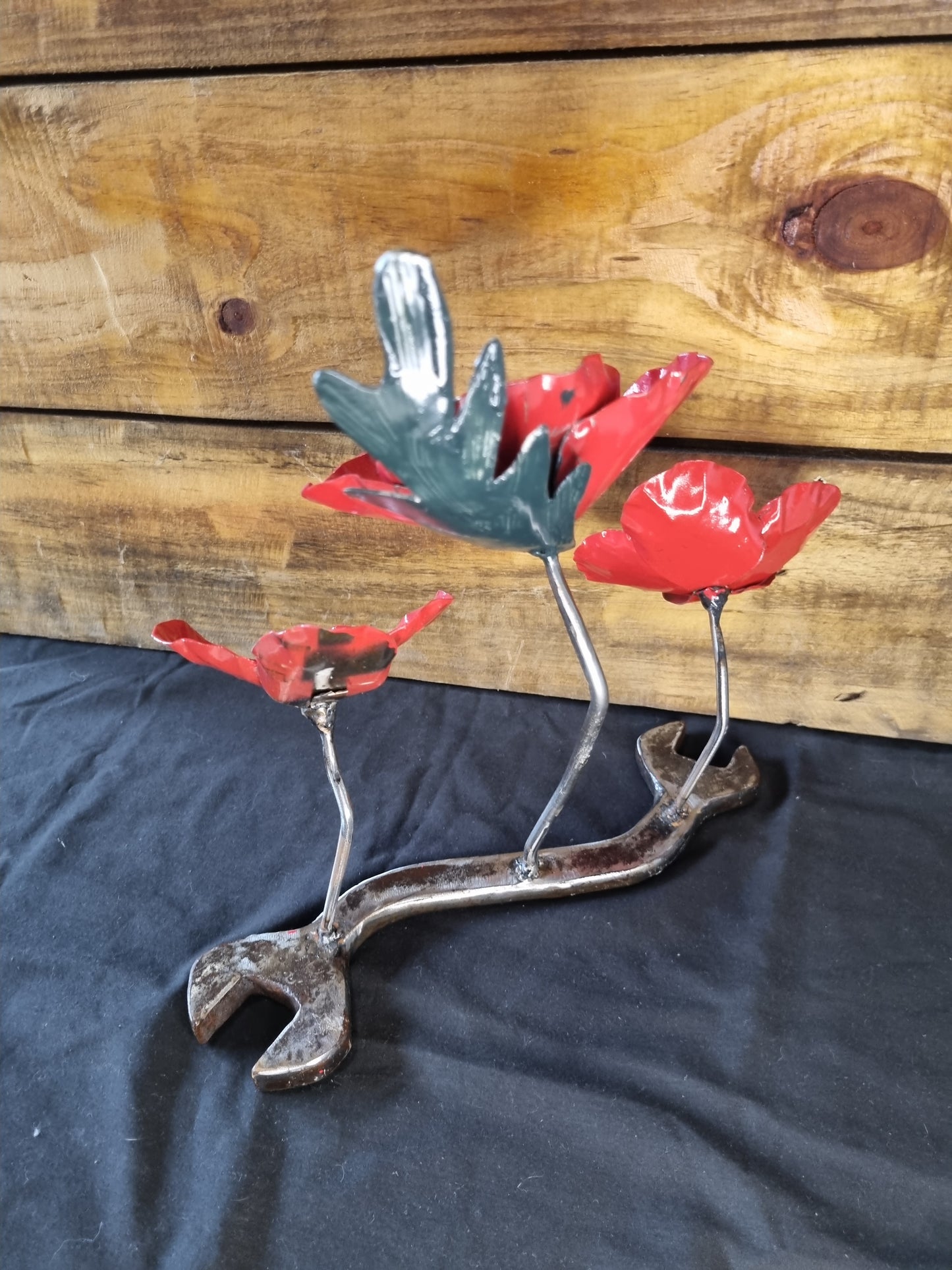 3 Poppies on a Spanner – A Bold Tribute in Reclaimed Metal