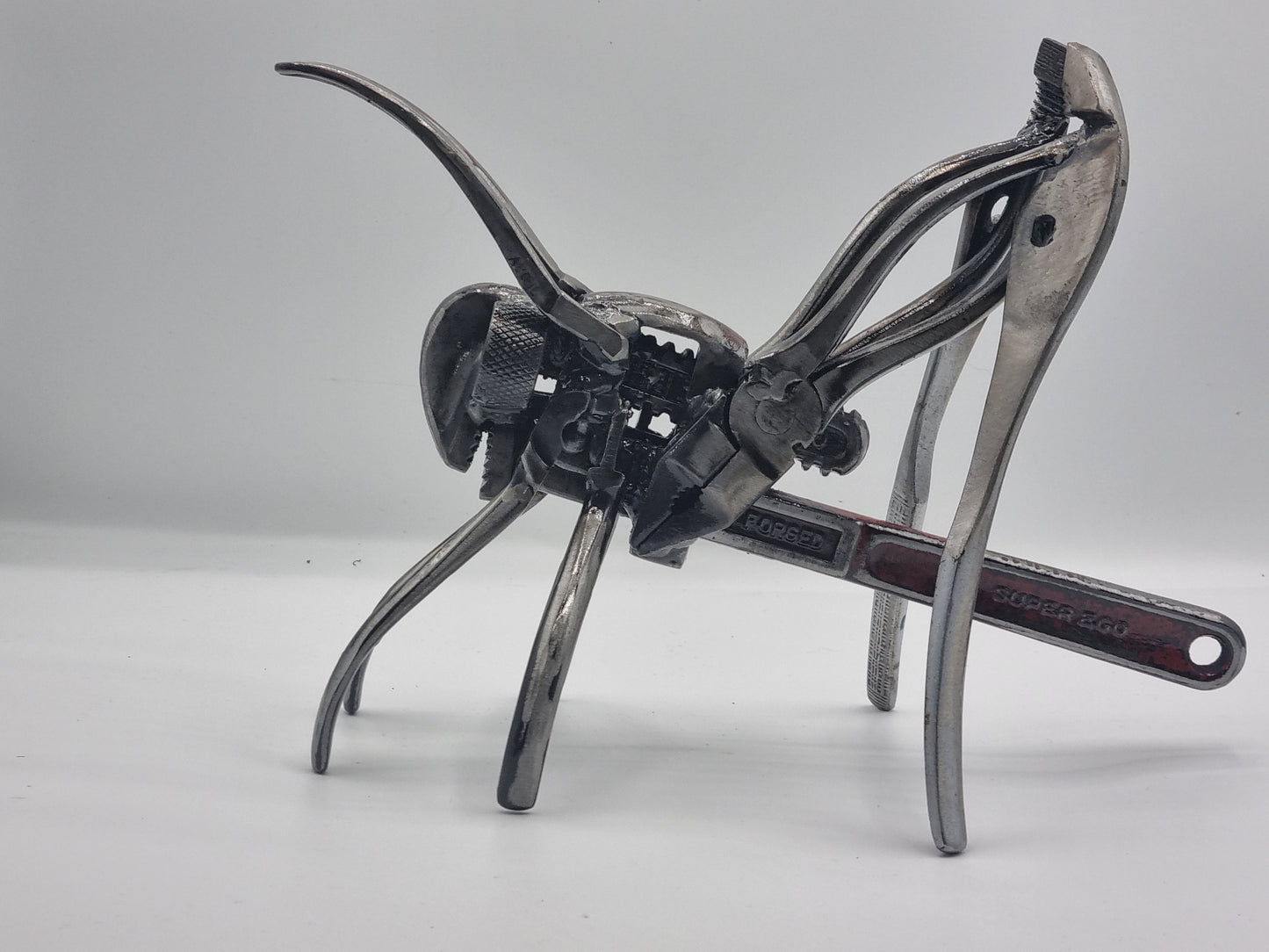 Upcycled Metal Grasshopper Sculpture