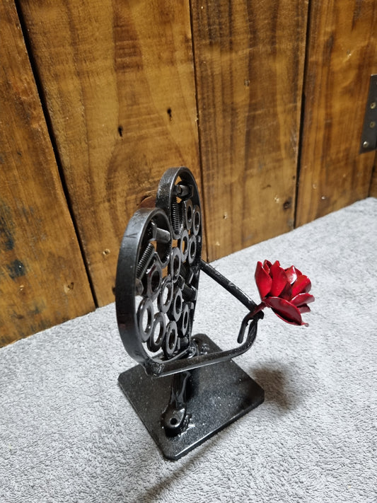 red rose on a infilled heart