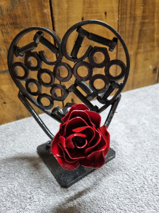 red rose on a infilled heart