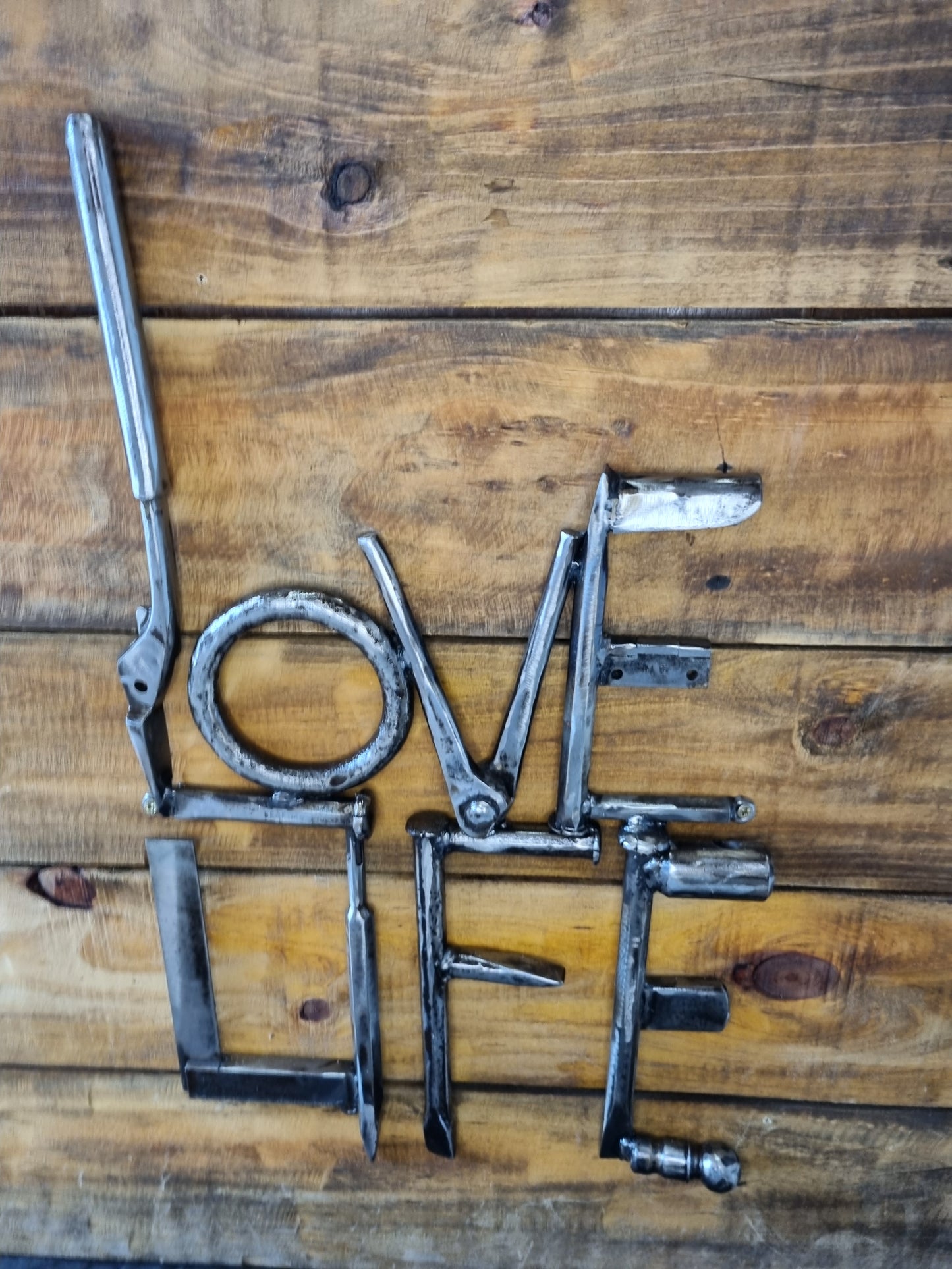Love Life Sign – Handmade with Heart from Found Tools